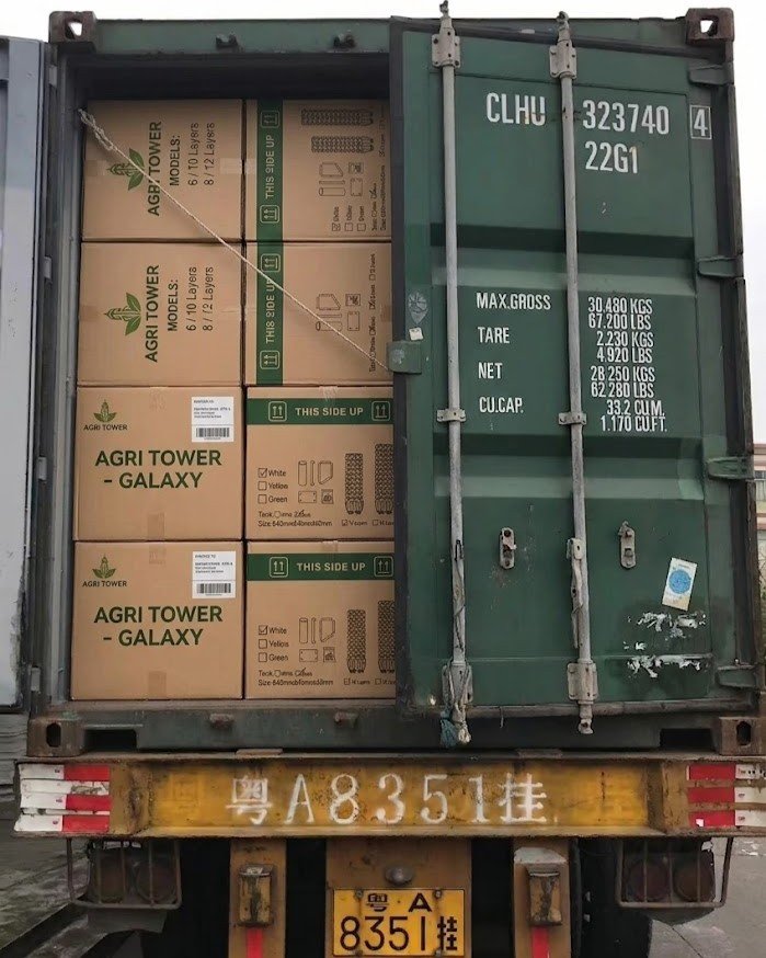 Agri Tower Galaxy and Solo systems being loaded into a shipping container in China
